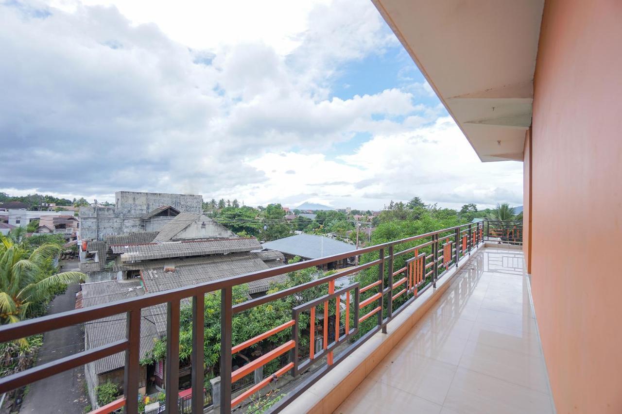 Super Oyo 2639 Oxy Townhouse Hotel Manado Eksteriør billede